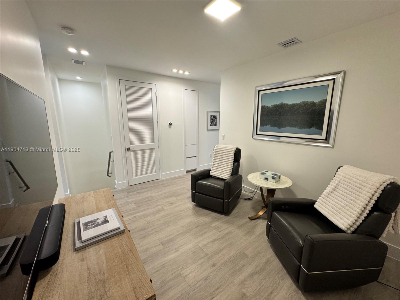 6824 Southwest 80th Street Miami, FL 33143 - Photo 16 of 29 a living room with furniture and a couch