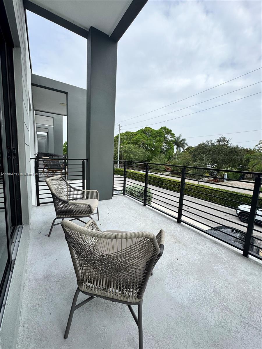 6824 Southwest 80th Street Miami, FL 33143 - Photo 21 of 29 a view of a terrace with furniture