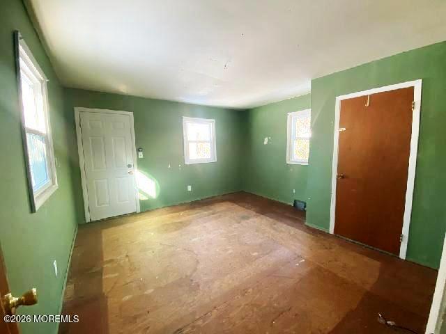 17 Clark Drive Howell, NJ 07731 - Photo 26 of 31 a view of an empty room with window and a kitchen