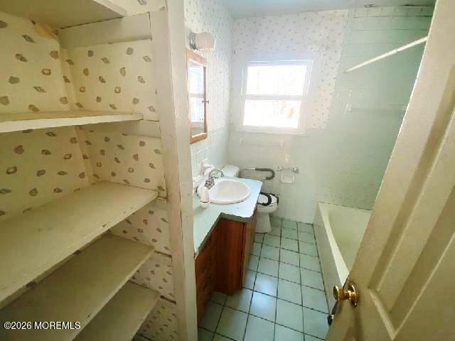 17 Clark Drive Howell, NJ 07731 - Photo 28 of 31 a bathroom with a sink and mirror
