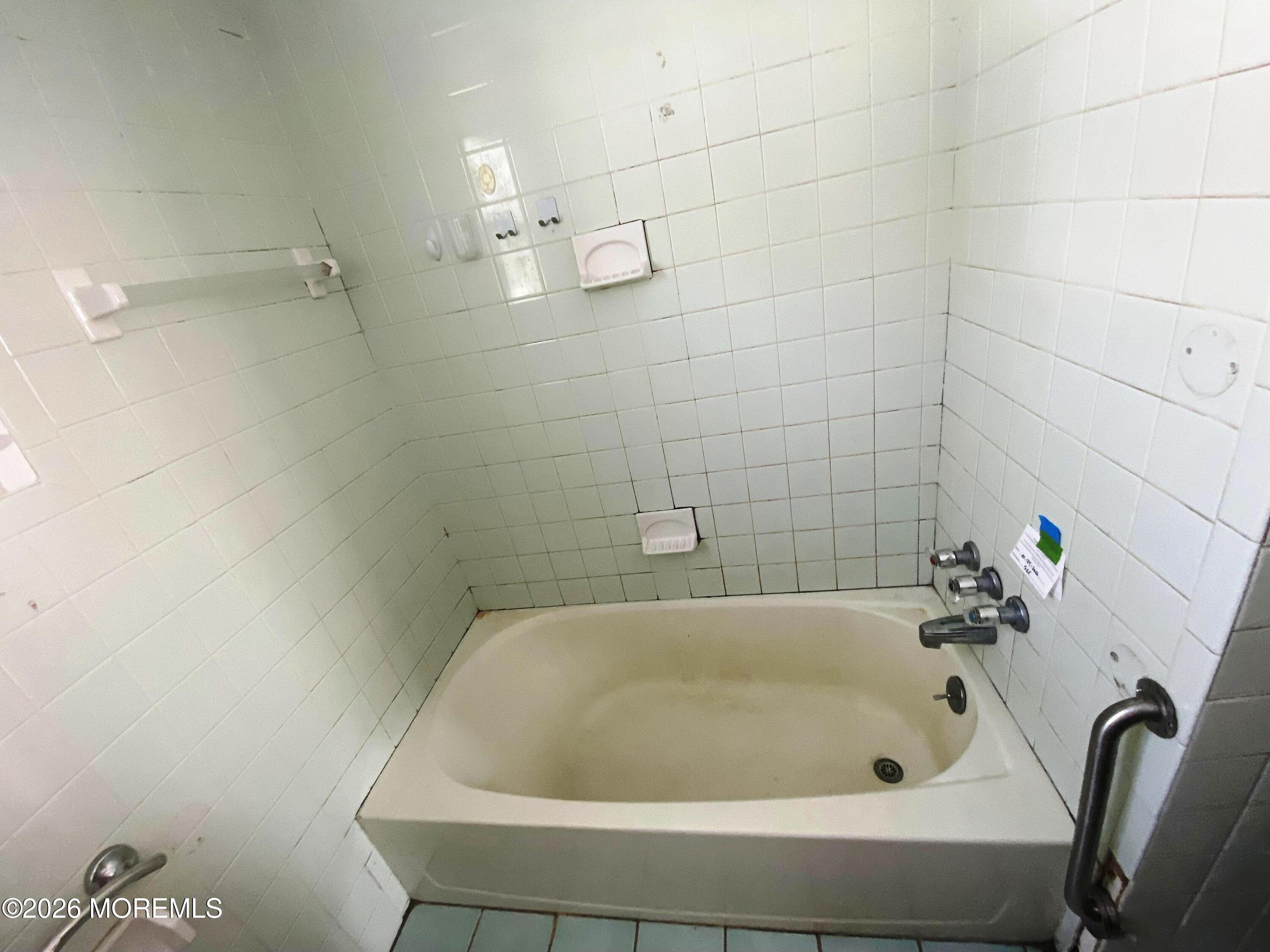 17 Clark Drive Howell, NJ 07731 - Photo 29 of 31 a bathroom with bathtub