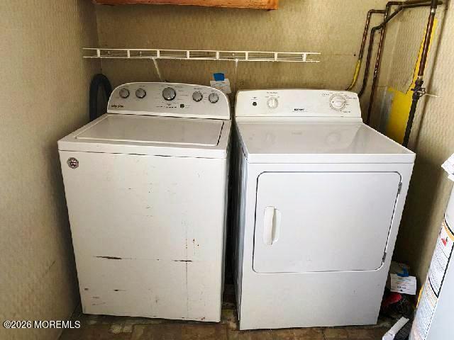 17 Clark Drive Howell, NJ 07731 - Photo 30 of 31 a utility room with dryer and washer