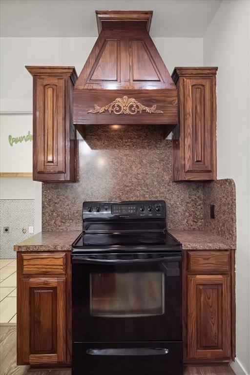504 Texas Street Tioga, TX 76271 - Photo 26 of 38 a stove top oven sitting inside of a kitchen