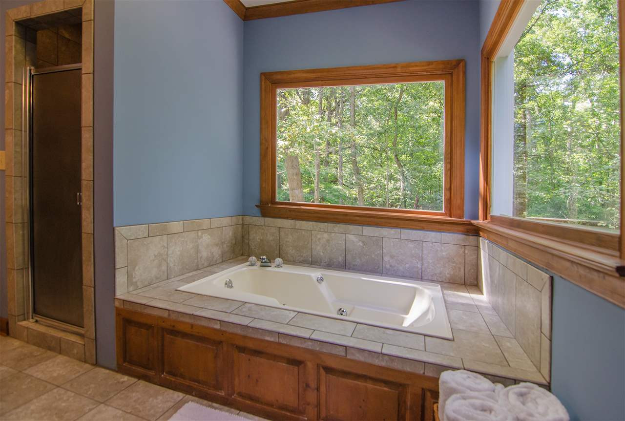 1301 Cool Spring Road Raleigh, NC 27614 - Photo 17 of 25 Updated bathroom with tile shower, tile surrounding the tub and tile floor. Master Bath/Spa