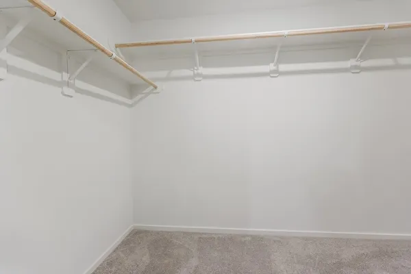 a view of an empty walk in closet