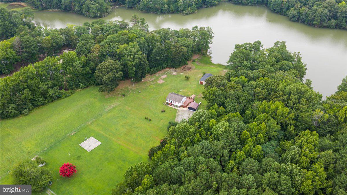 141 Raintree Lane Reedville, VA 22539 - Photo 6 of 86 Serene lakeside retreat surrounded by nature.