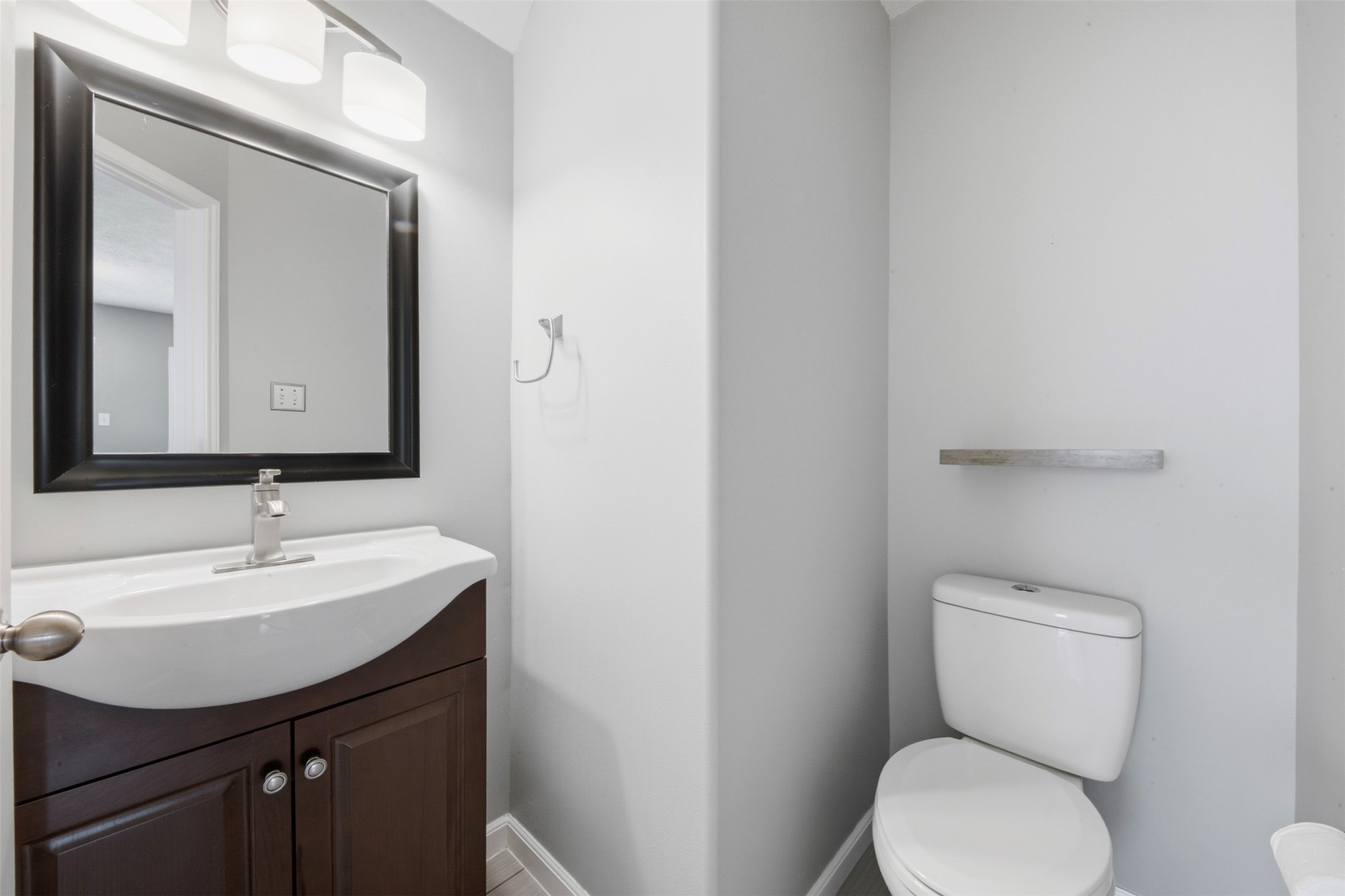 2446 Halstead Drive Spring, TX 77386 - Photo 10 of 45 Updated half bathroom downstairs.