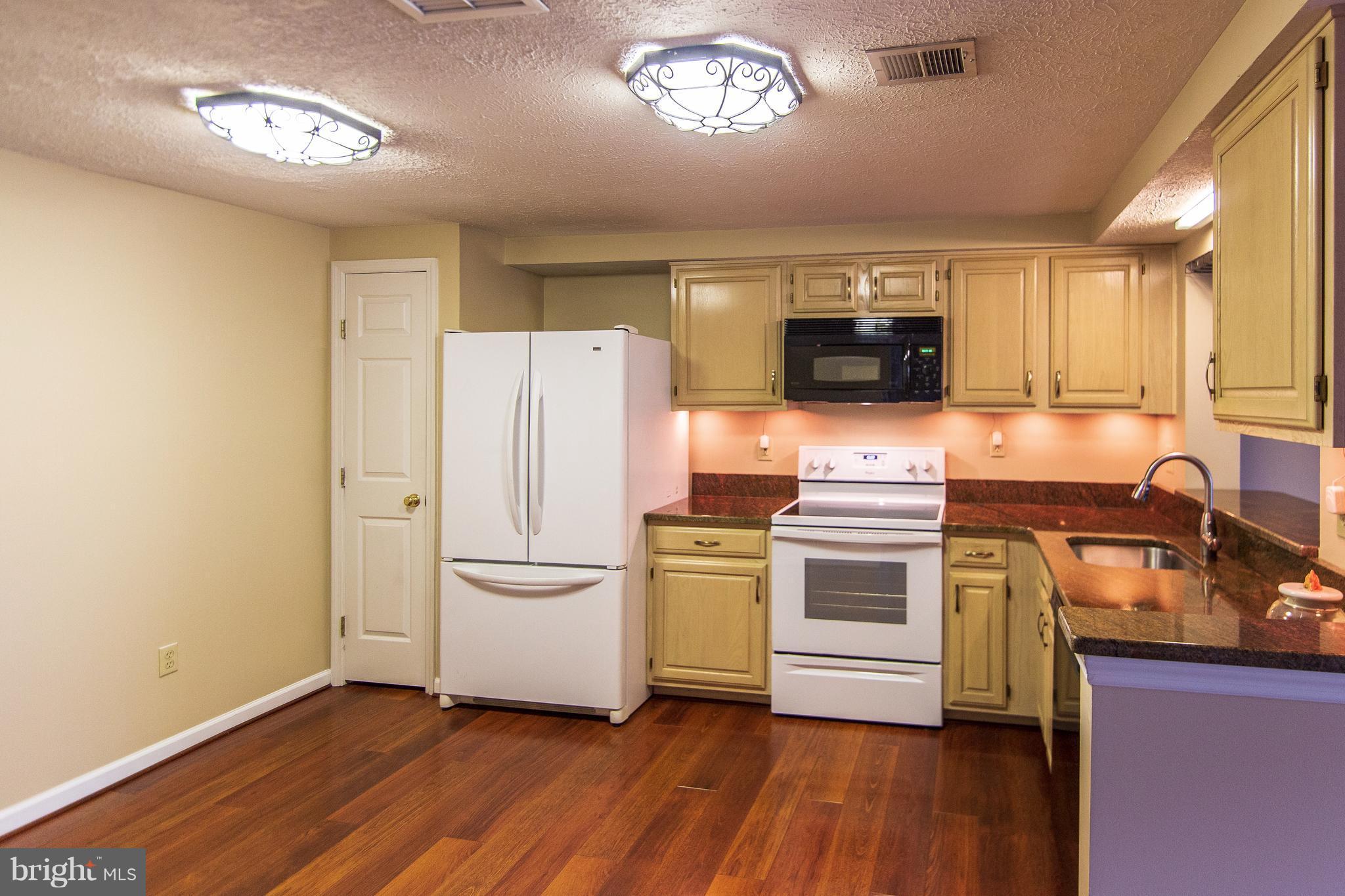 593 Cascade Way Frederick, MD 21703 - Photo 14 of 24 Kitchen newer lighting and appliances