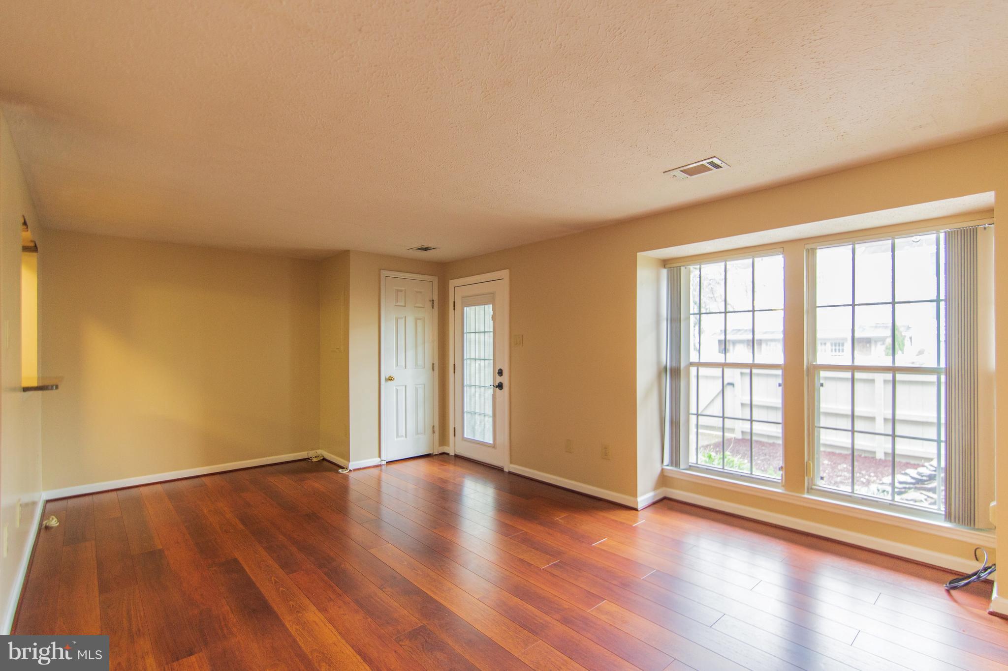 593 Cascade Way Frederick, MD 21703 - Photo 7 of 24 Large great room with huge windows and cutom blind