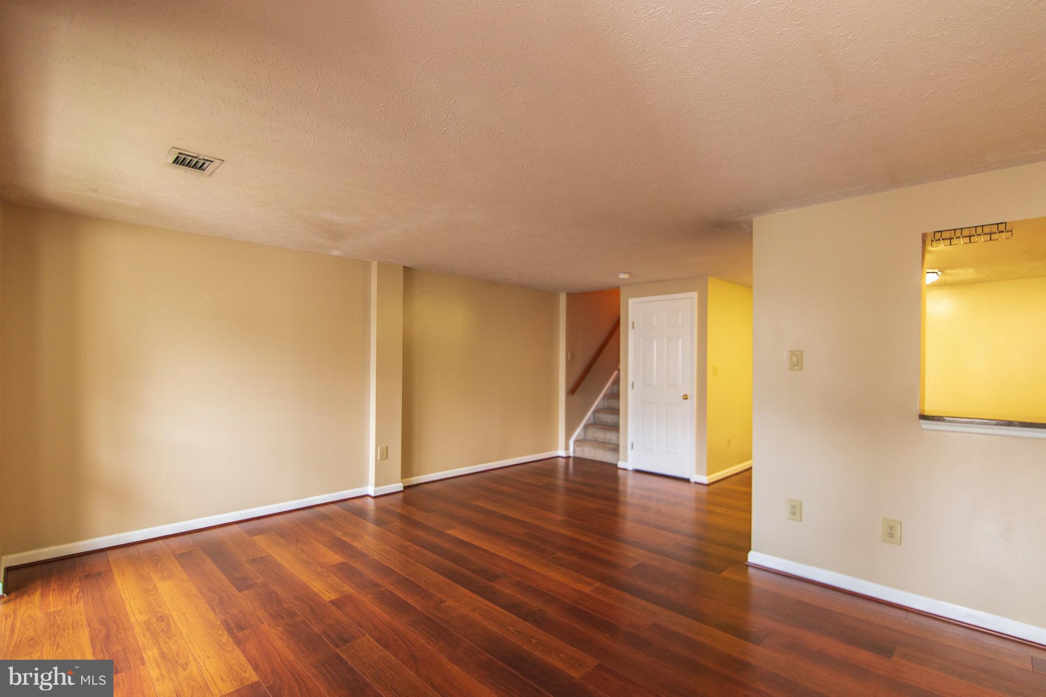 593 Cascade Way Frederick, MD 21703 - Photo 10 of 24 view to kitchen pass-thru and stairs