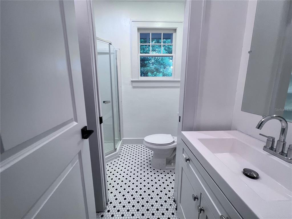 204 Northwest 3 Street Gainesville, FL 32601 - Photo 4 of 5 a bathroom with a sink and a toilet
