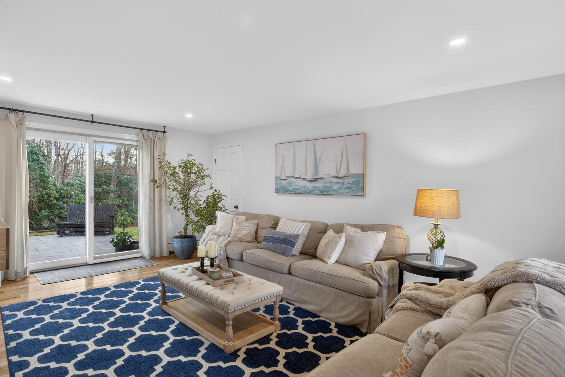 24 Surrey Lane Sandwich, MA 02563 - Photo 18 of 61 a living room with furniture and a large window