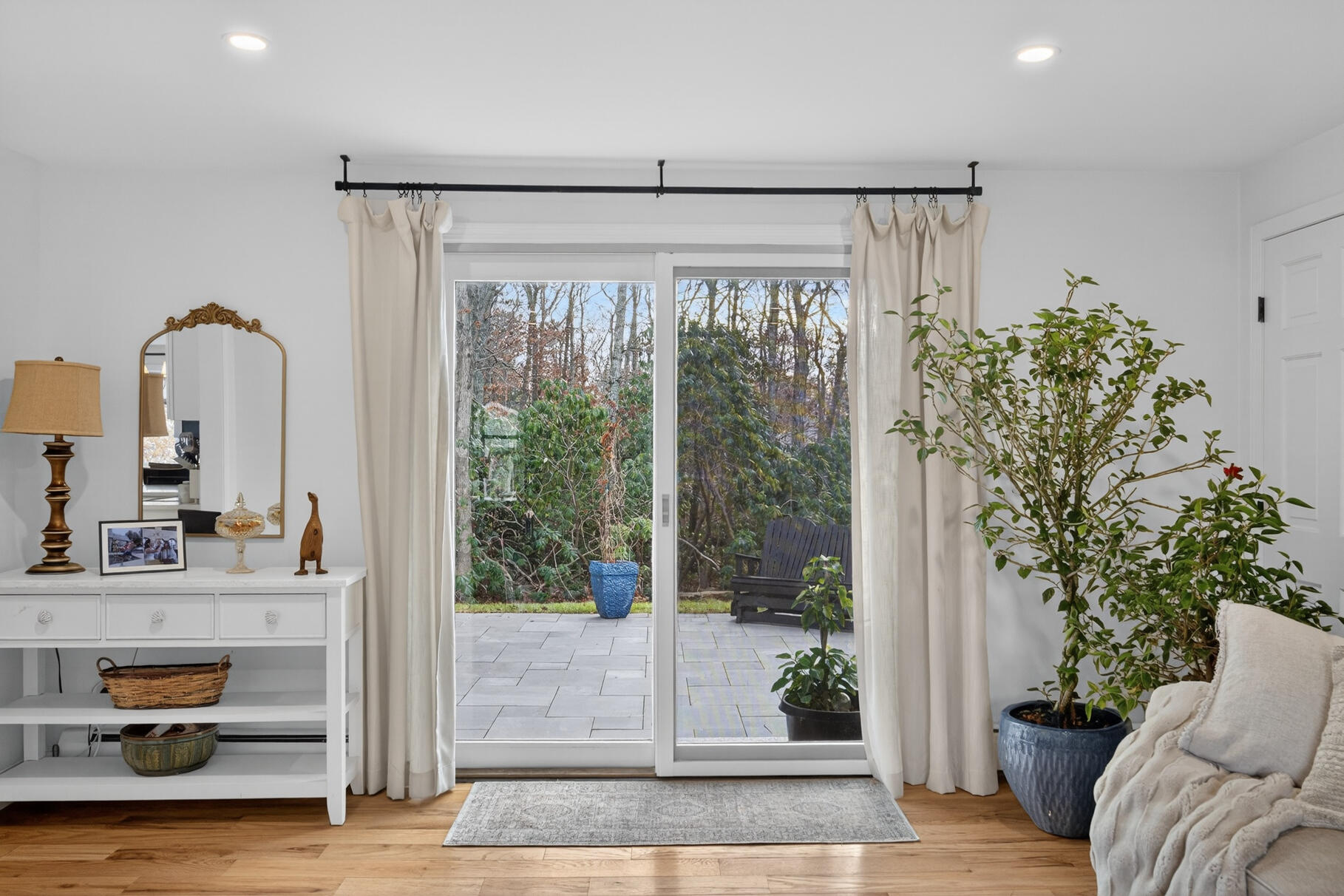 24 Surrey Lane Sandwich, MA 02563 - Photo 22 of 61 a living room with furniture and a potted plant