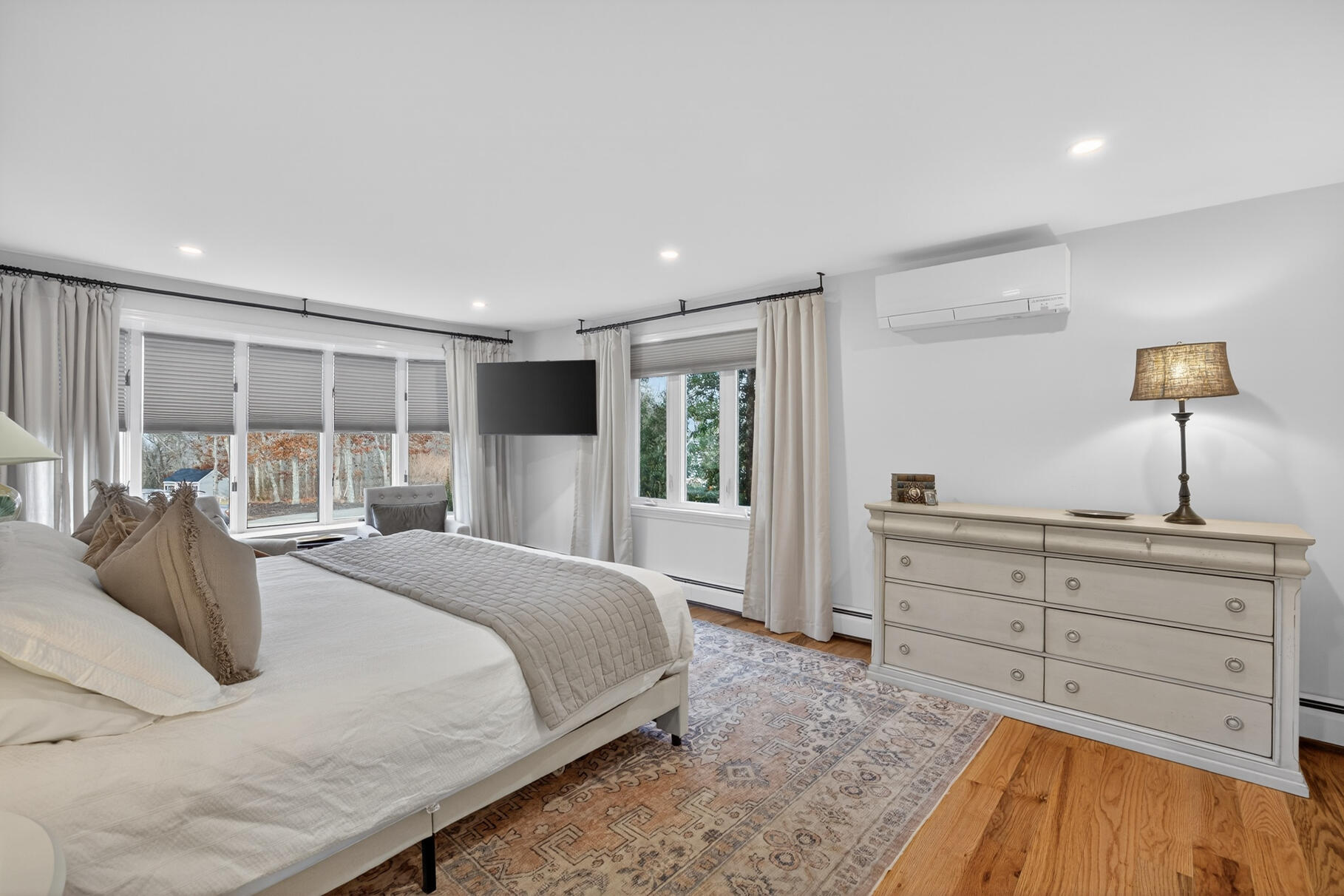 24 Surrey Lane Sandwich, MA 02563 - Photo 25 of 61 a spacious bedroom with a large bed and a window