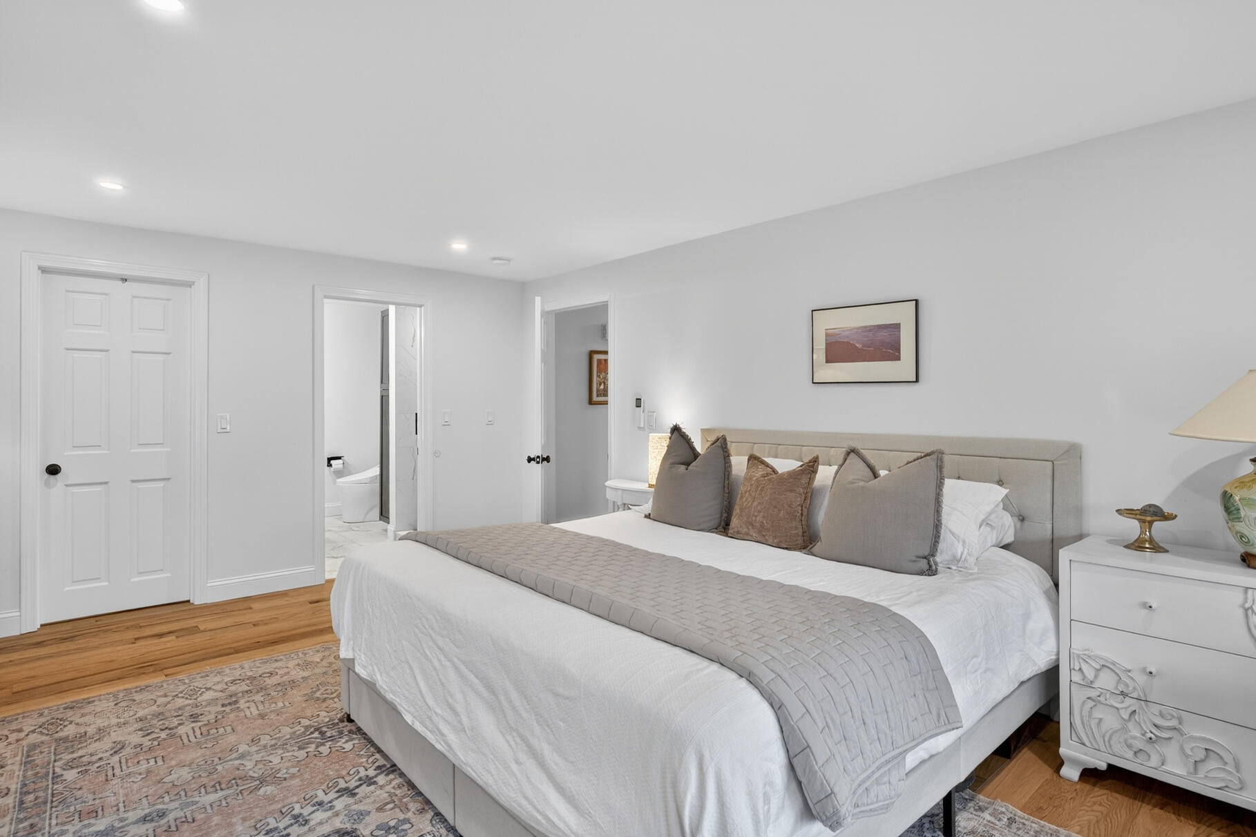 24 Surrey Lane Sandwich, MA 02563 - Photo 26 of 61 a bed room with a bed and a couch