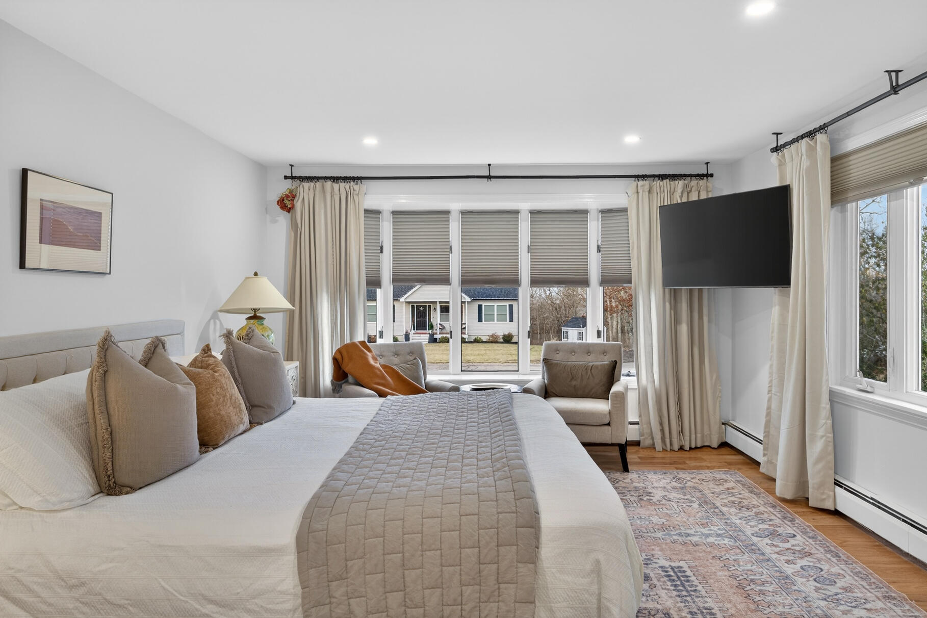 24 Surrey Lane Sandwich, MA 02563 - Photo 28 of 61 a bedroom with bed and glass door