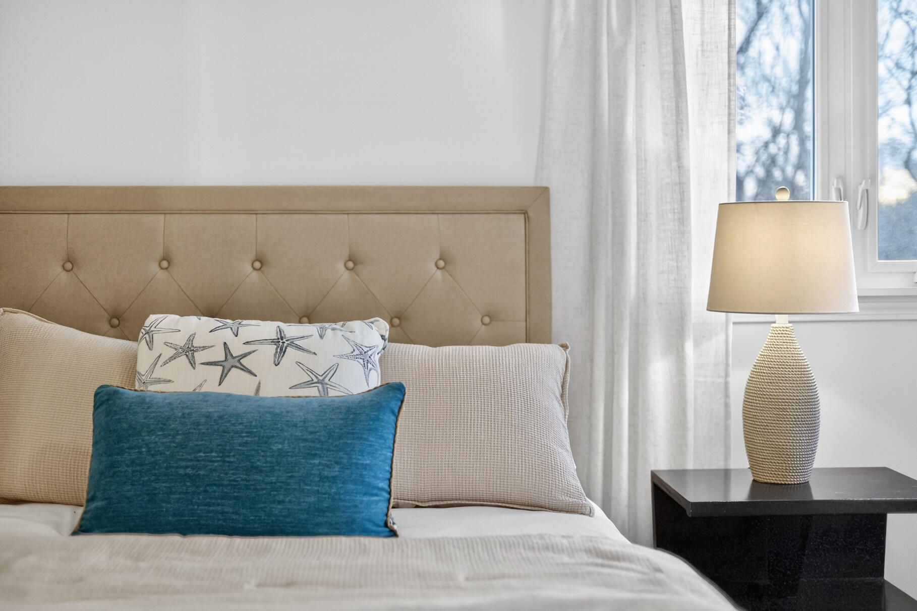 24 Surrey Lane Sandwich, MA 02563 - Photo 36 of 61 a living room with a couch and a table