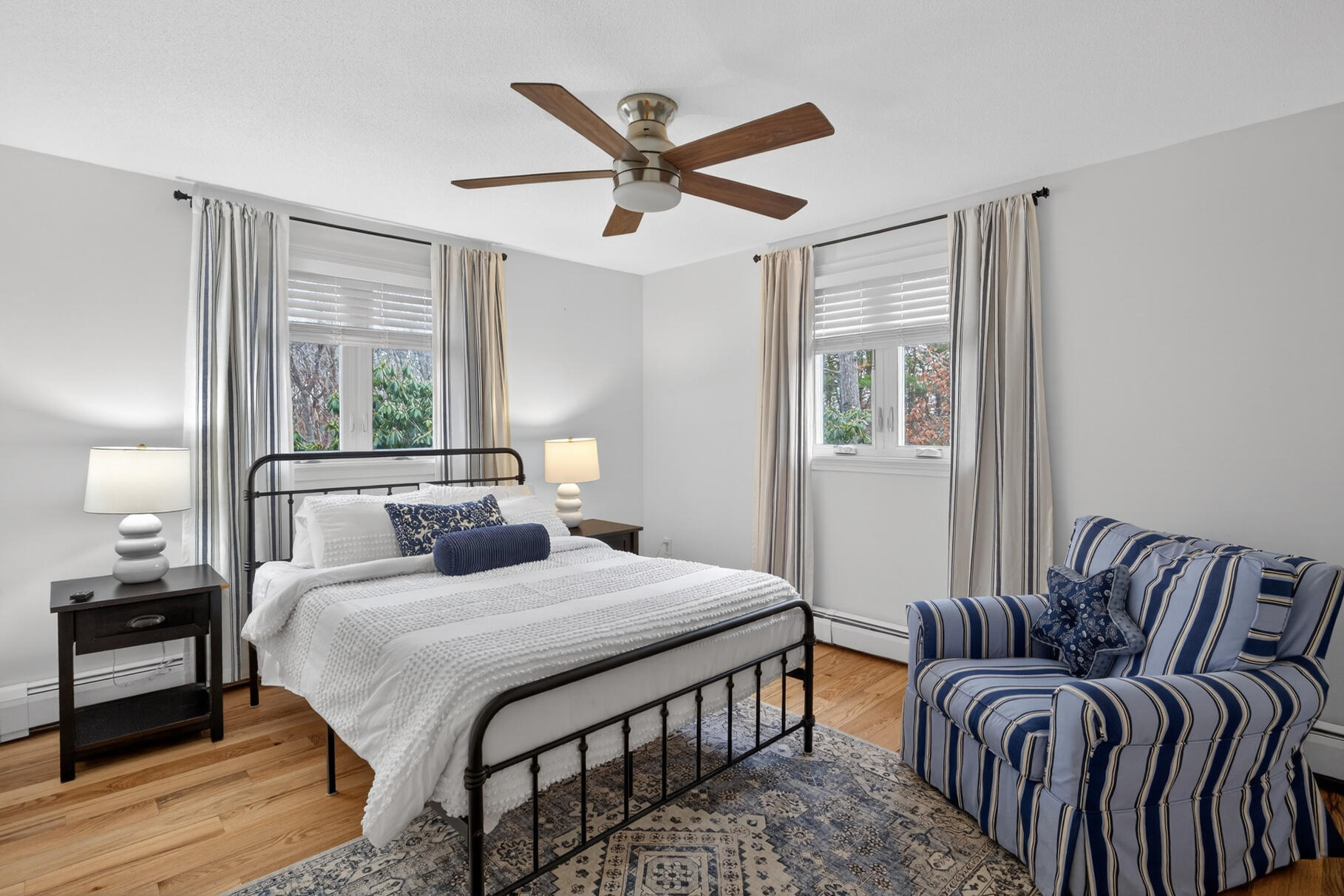 24 Surrey Lane Sandwich, MA 02563 - Photo 37 of 61 a bedroom with double bed and a large window