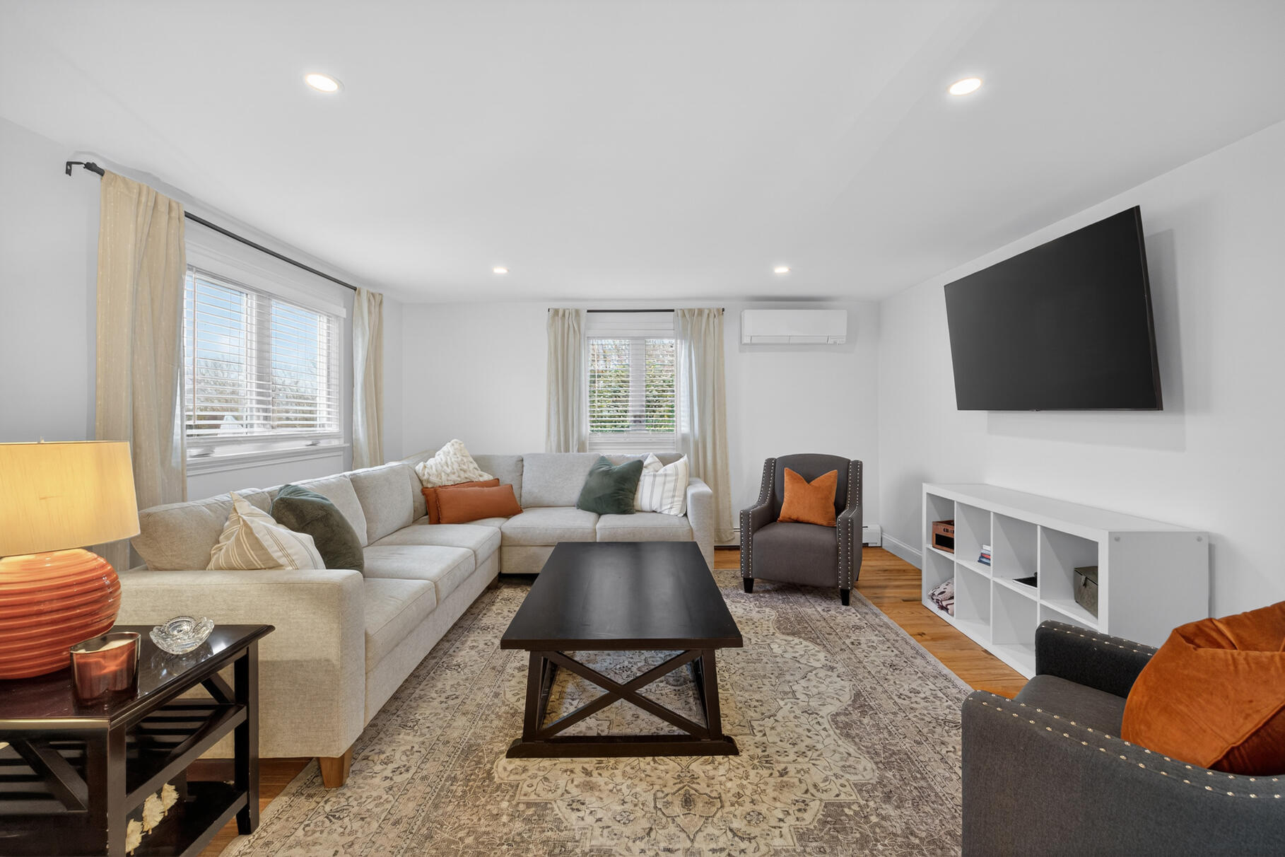 24 Surrey Lane Sandwich, MA 02563 - Photo 43 of 61 a living room with furniture and a flat screen tv