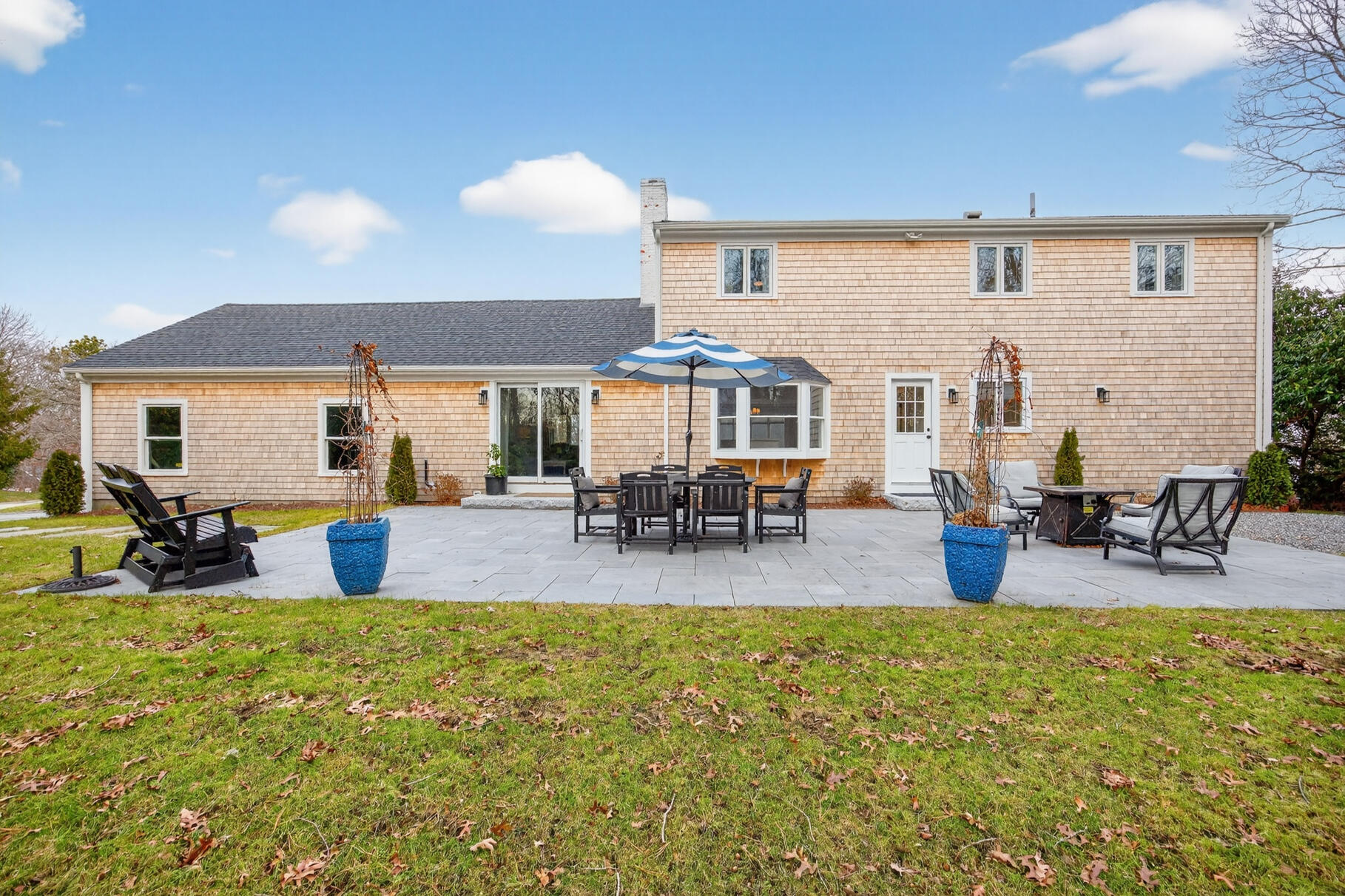 24 Surrey Lane Sandwich, MA 02563 - Photo 53 of 61 a view of a house with swimming pool and sitting area