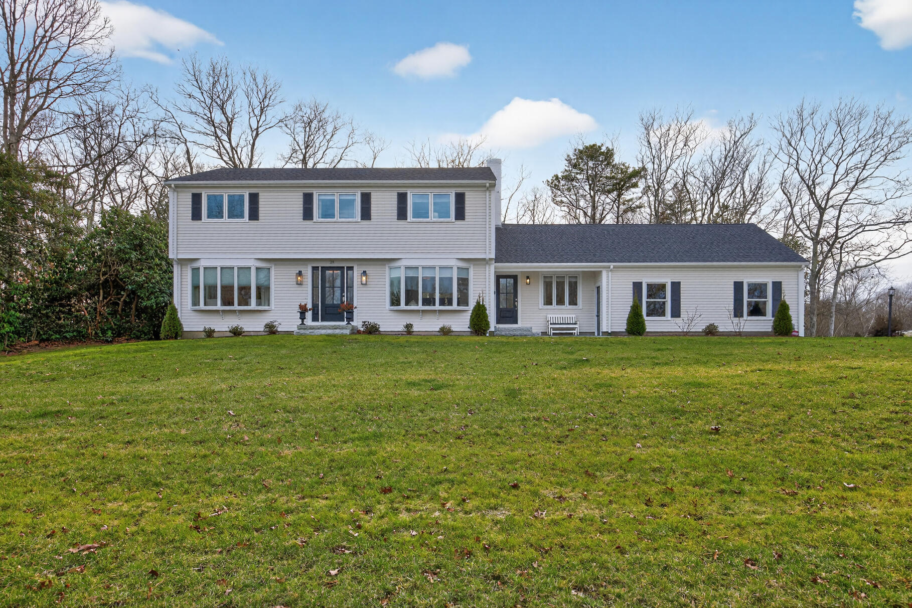 24 Surrey Lane Sandwich, MA 02563 - Photo 61 of 61 a front view of house with yard and green space