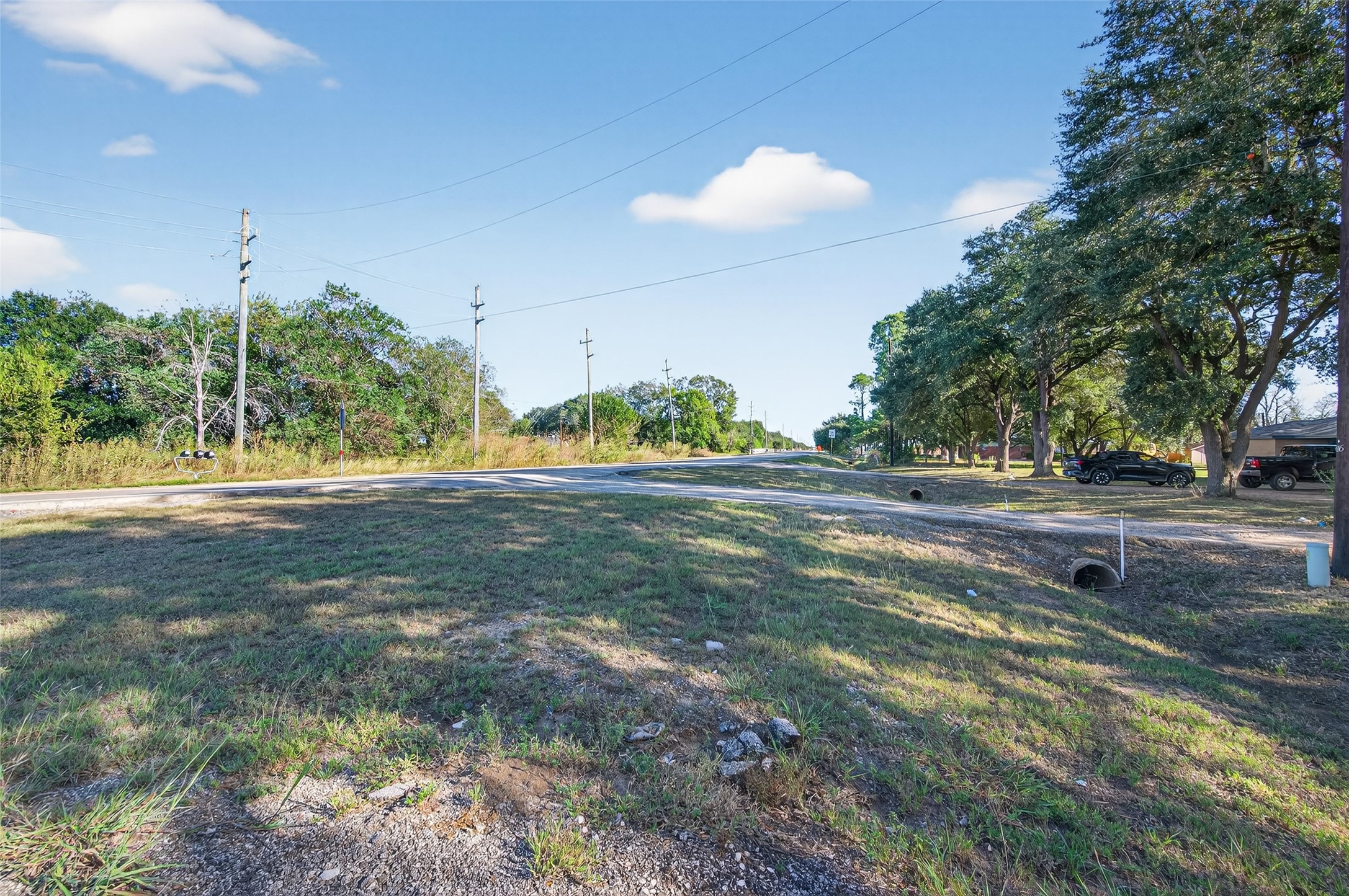 402 FM 360 Road Beasley, TX 77417 - Photo 6 of 12 a view of outdoor space with green field and trees
