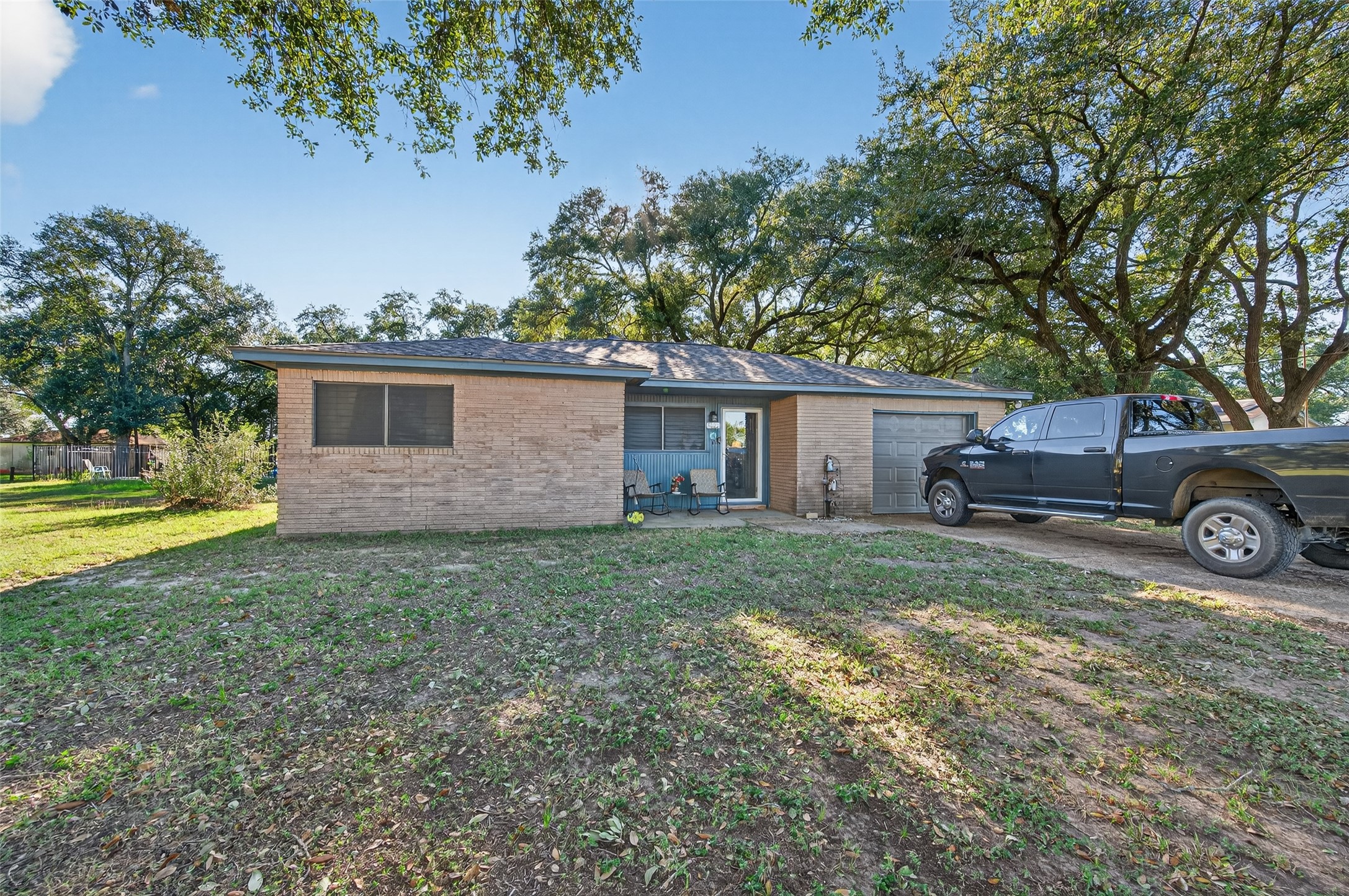 402 FM 360 Road Beasley, TX 77417 - Photo 7 of 12 a view of a house with a back yard
