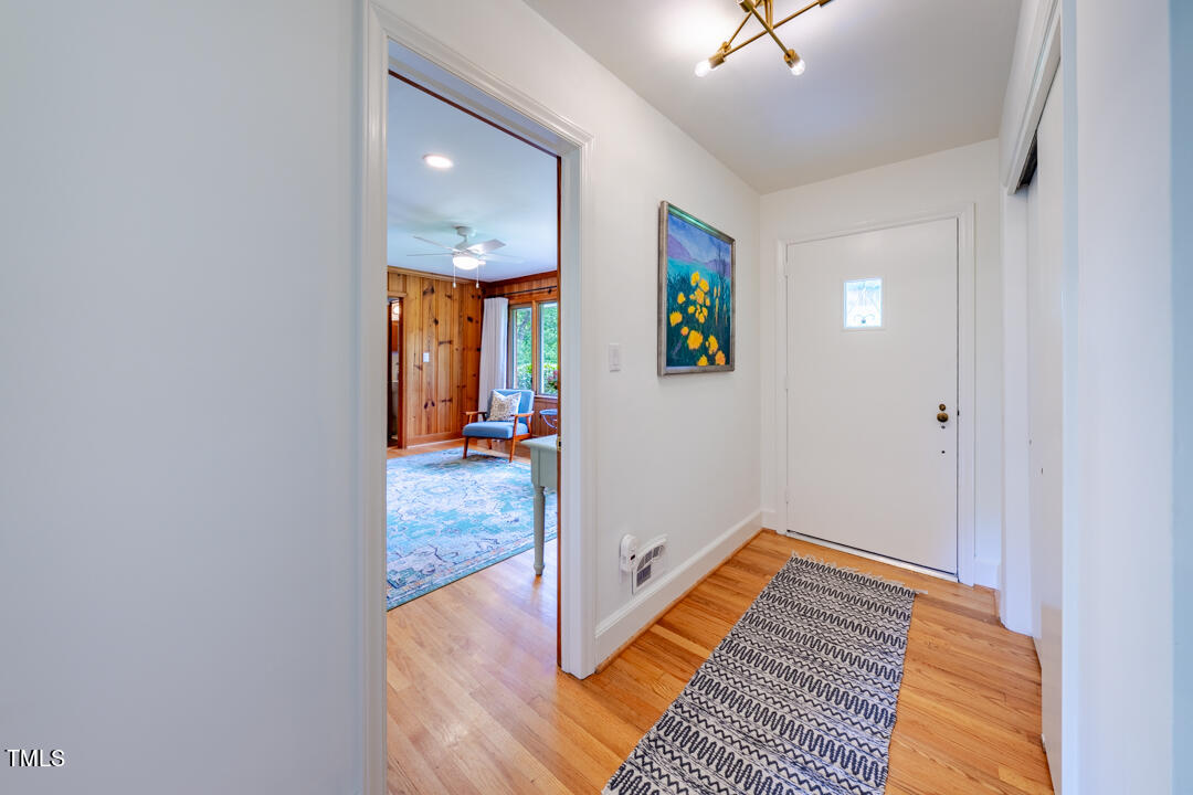 4621 Erwin Road Durham, NC 27705 - Photo 13 of 40 a view of hallway with wooden floor