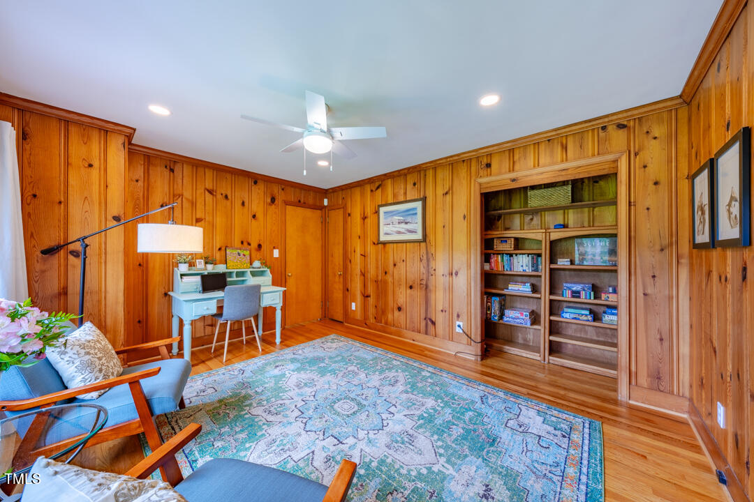 4621 Erwin Road Durham, NC 27705 - Photo 14 of 40 an empty room with bookshelf