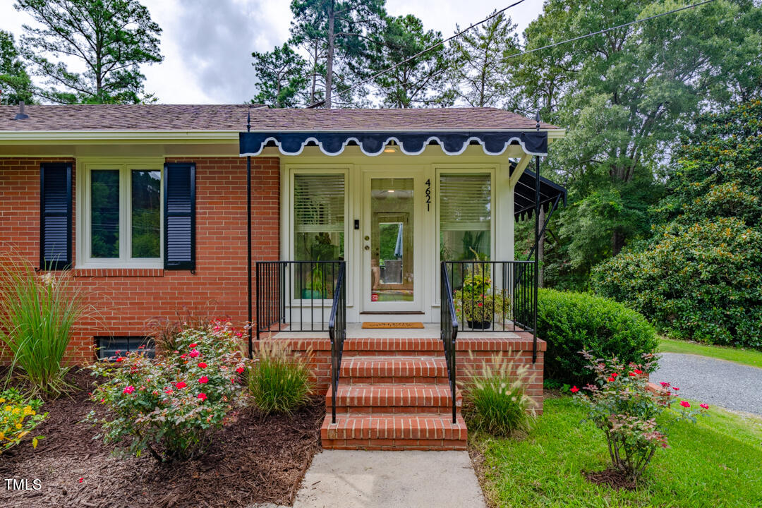 4621 Erwin Road Durham, NC 27705 - Photo 3 of 40 a front view of a house with garden