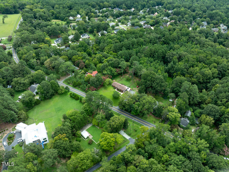 4621 Erwin Road Durham, NC 27705 - Photo 35 of 40 an aerial view of residential house with outdoor space and trees all around