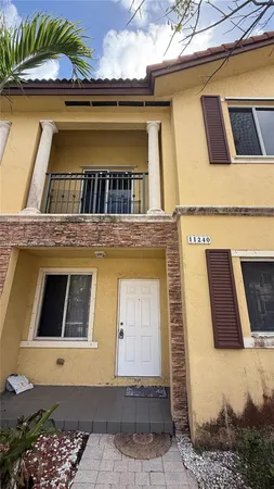 a front view of house with yard