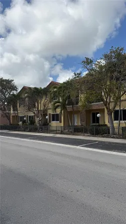 front view of a house with a street