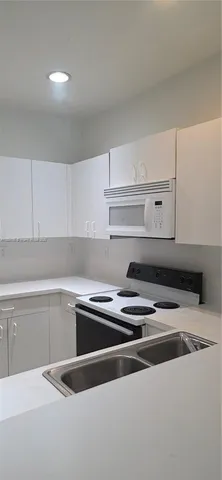 a close view of appliances in kitchen