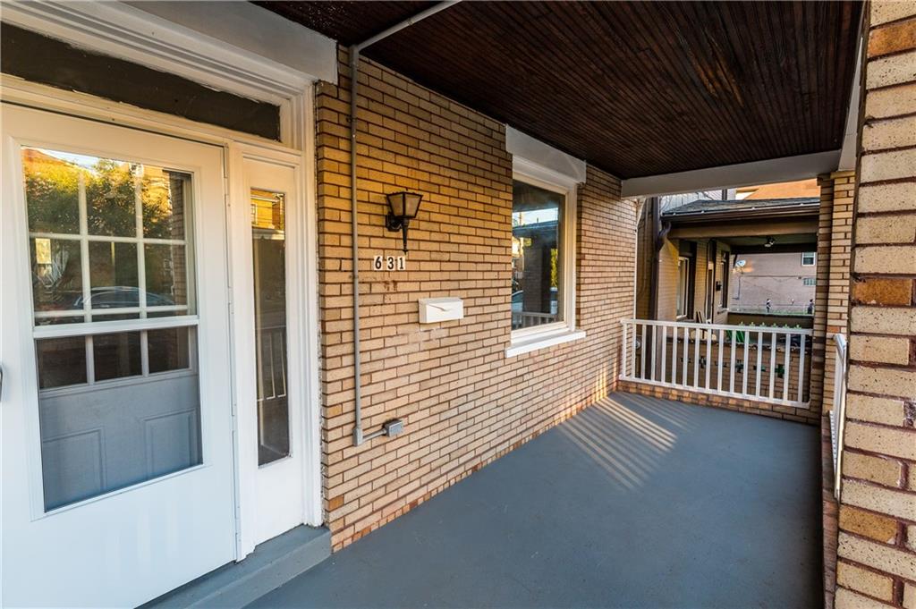 631 Beaver Road Ambridge, PA 15003 - Photo 2 of 25 This residence boasts a large front porch, great for enjoying the sunset or just relaxing after a long day.