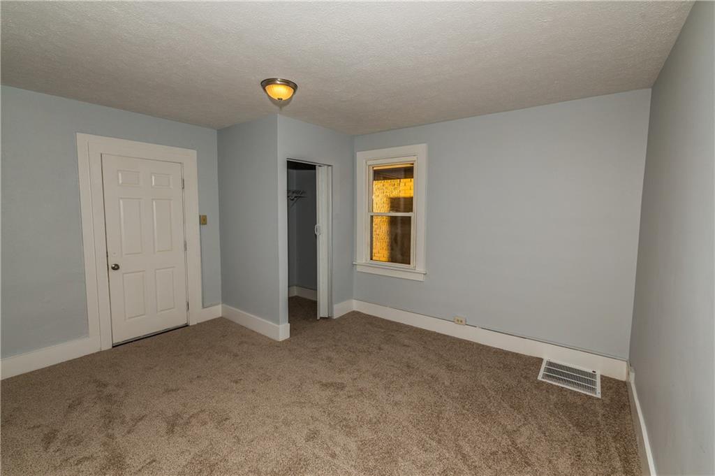 631 Beaver Road Ambridge, PA 15003 - Photo 8 of 25 2nd floor master has new wall to wall carpet plenty of natural lighting. Back door leads to a private third level deck, ideal for relaxation and downtime.