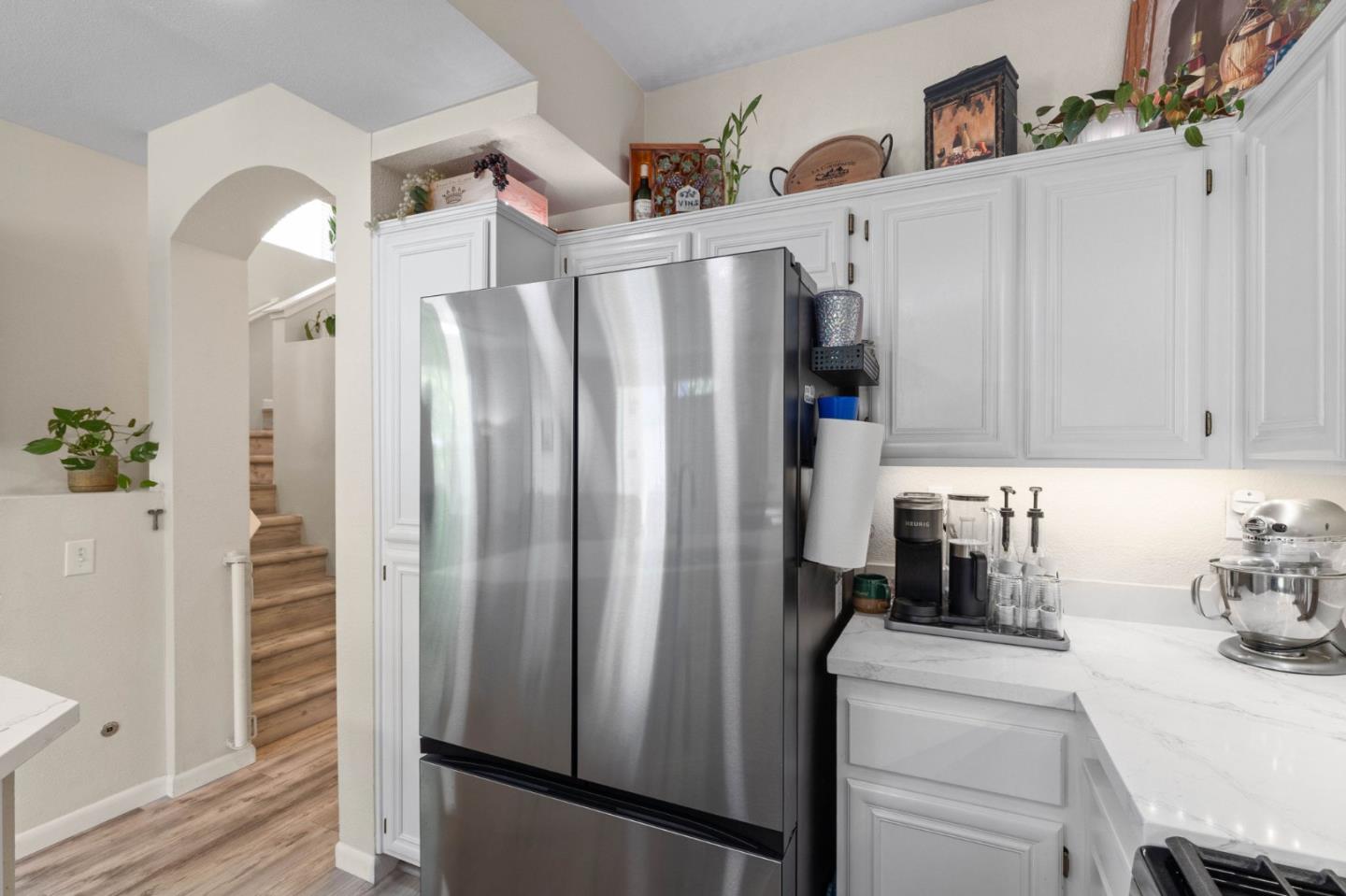 3337 Midtown Place San Jose, CA 95136 - Photo 13 of 32 a kitchen with stainless steel appliances a refrigerator and cabinets