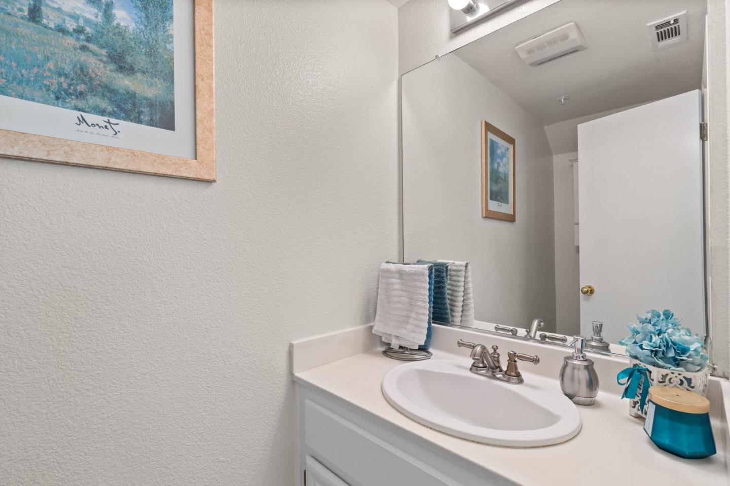 3337 Midtown Place San Jose, CA 95136 - Photo 15 of 32 a bathroom with a sink and a mirror