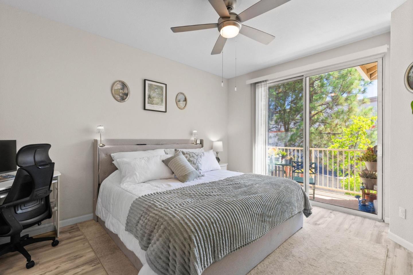 3337 Midtown Place San Jose, CA 95136 - Photo 16 of 32 a bedroom with a large bed and a chandelier