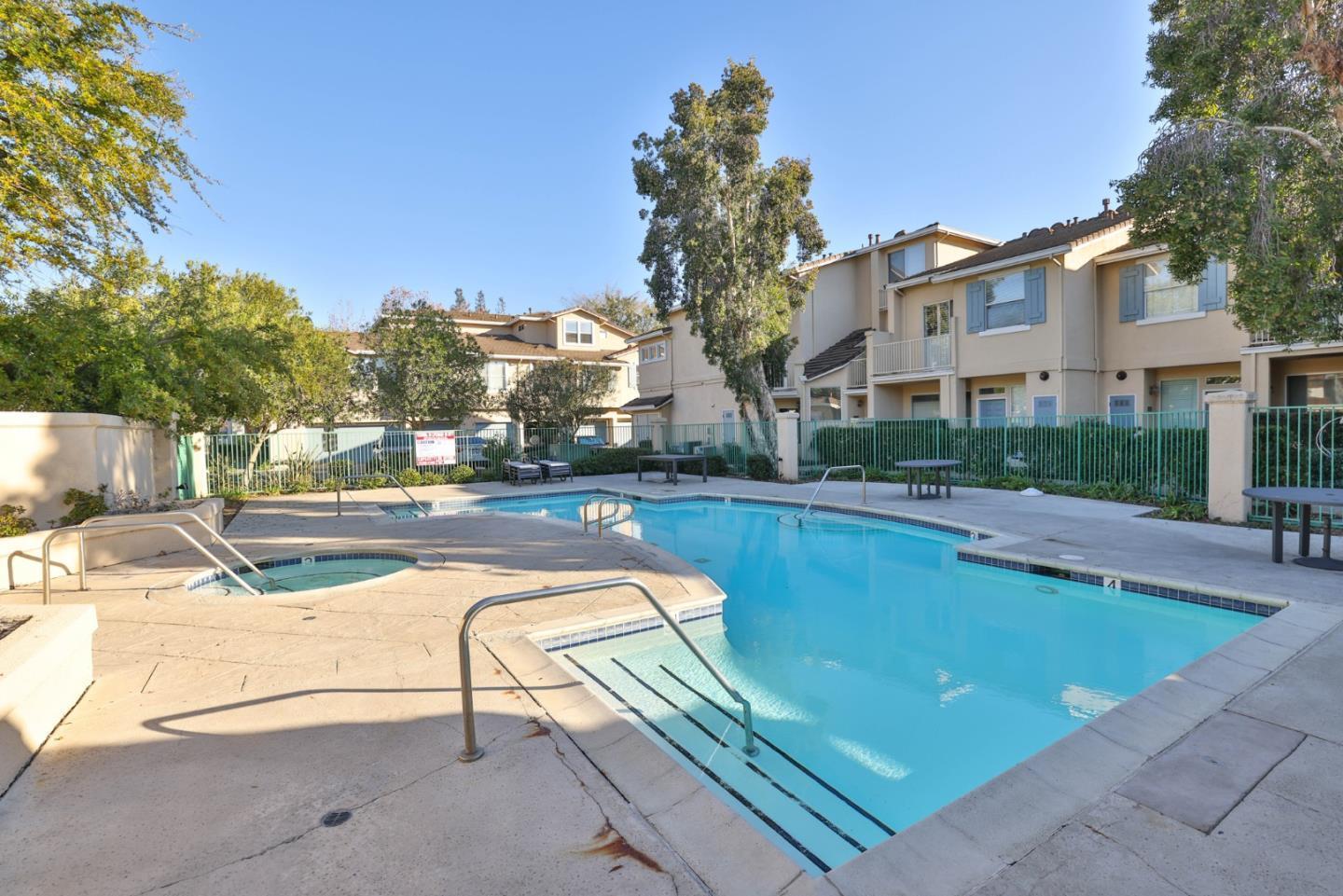 3337 Midtown Place San Jose, CA 95136 - Photo 30 of 32 a view of a swimming pool with a lounge chairs