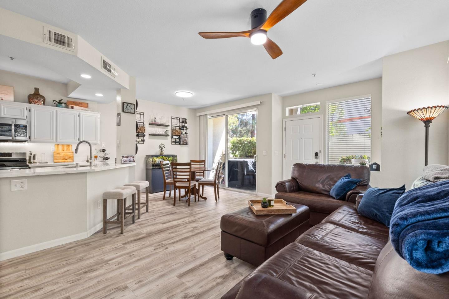 3337 Midtown Place San Jose, CA 95136 - Photo 6 of 32 a living room with furniture and a large window