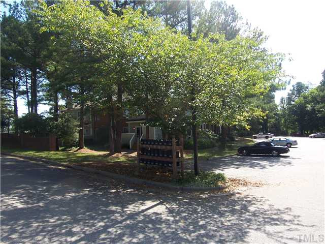 3201 Mill Run Raleigh, NC 27612 - Photo 12 of 12 A wonderfully wooded community. You mailbox is right next to your home and there is ample parking. Walk across the street to coffee shops and retail. Exterior Front