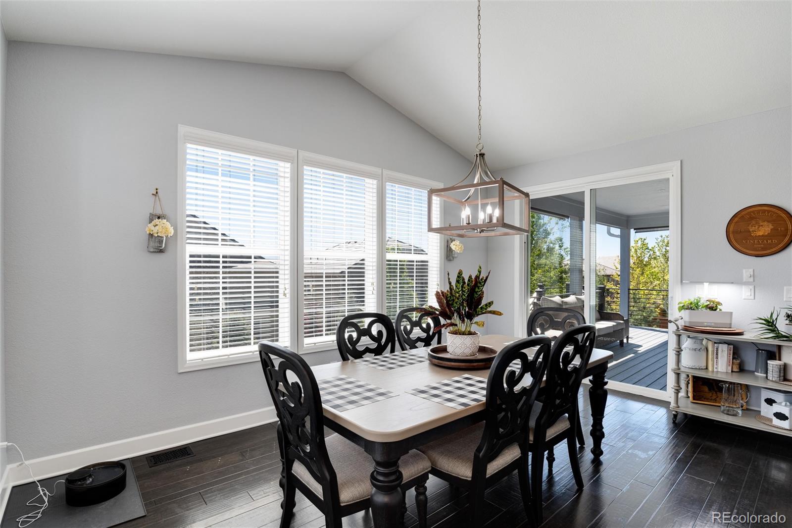 14390 Double Dutch Loop Parker, CO 80134 - Photo 17 of 50 a view of a dining room with furniture window and outside view