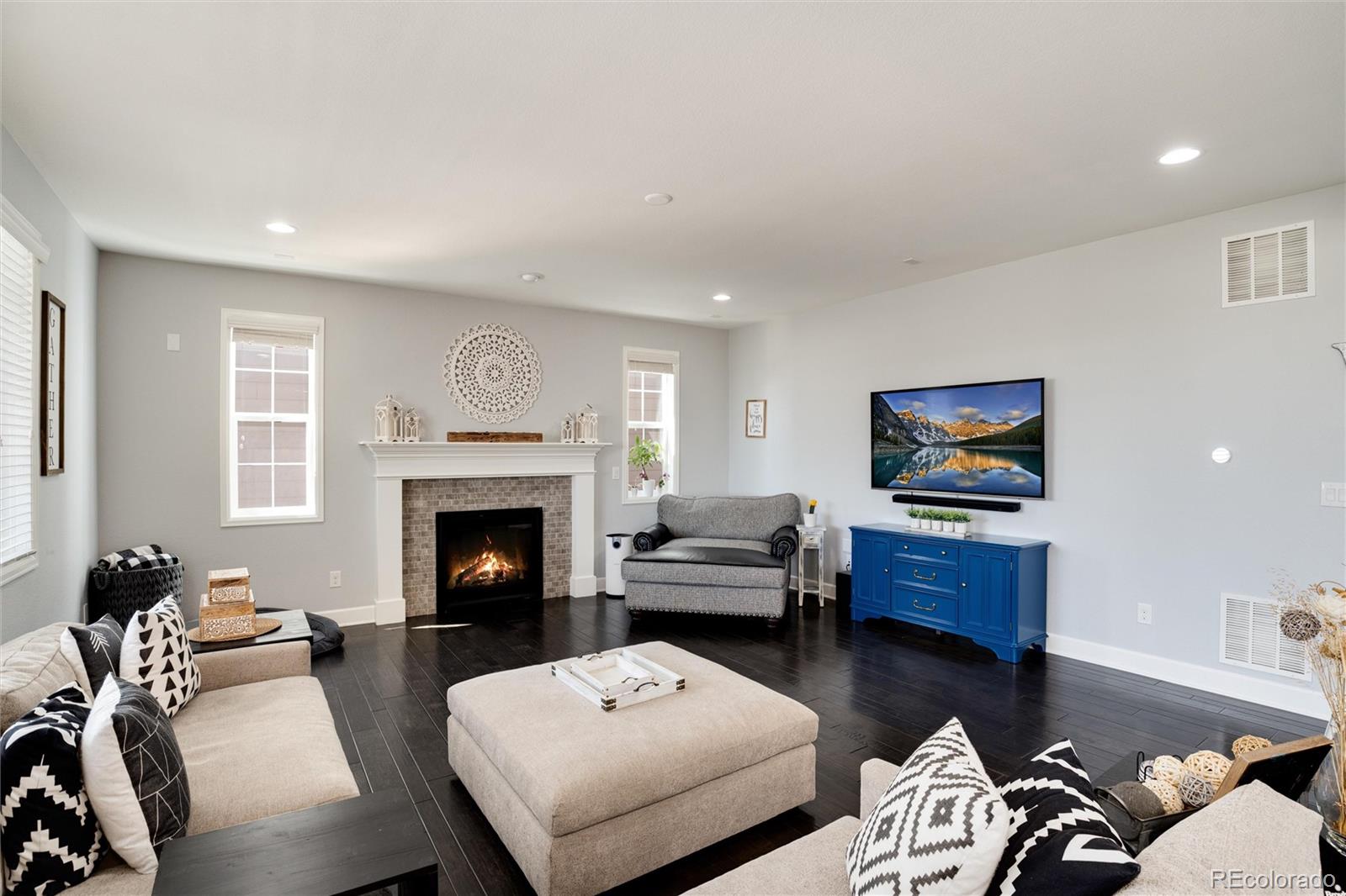 14390 Double Dutch Loop Parker, CO 80134 - Photo 18 of 50 a living room with furniture fireplace and window