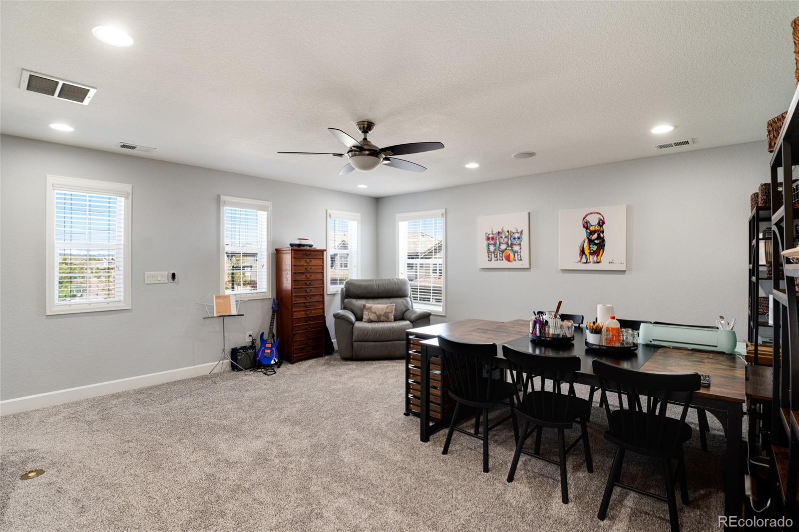 14390 Double Dutch Loop Parker, CO 80134 - Photo 25 of 50 a view of a dining room with furniture