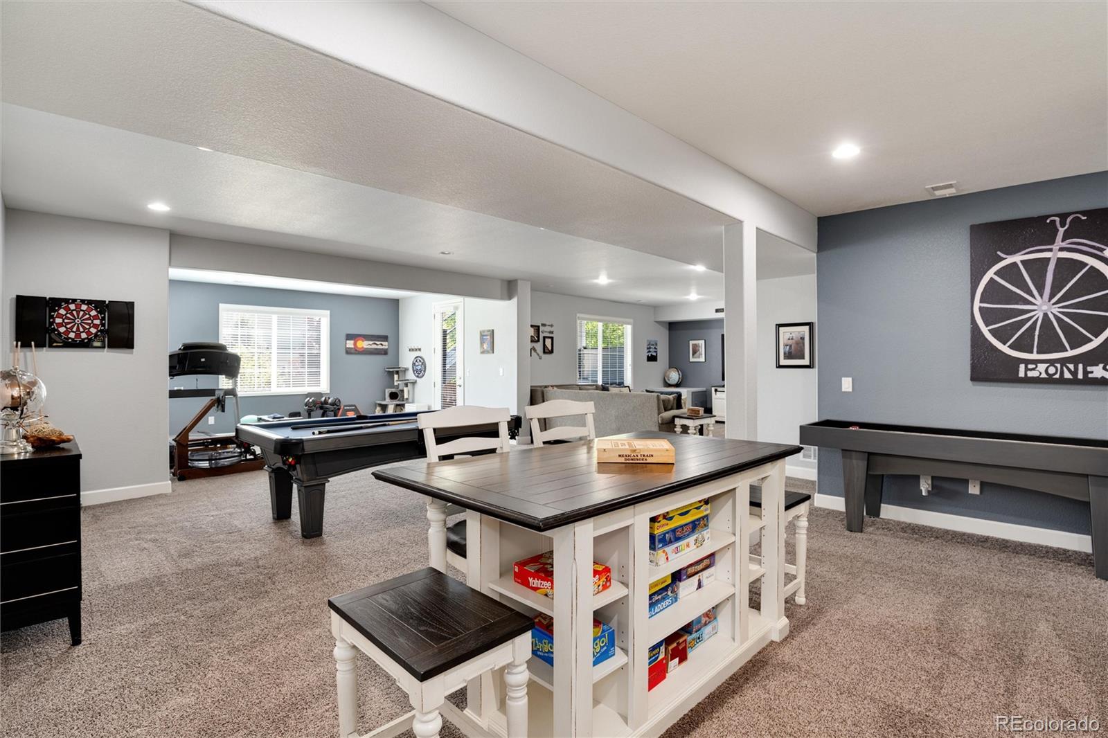 14390 Double Dutch Loop Parker, CO 80134 - Photo 34 of 50 a kitchen with stainless steel appliances granite countertop a stove and a sink