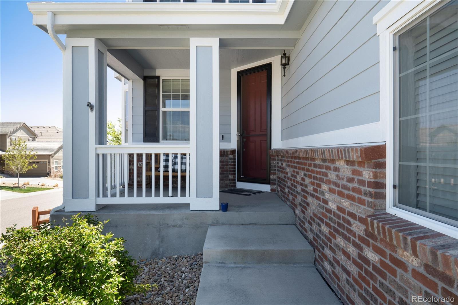 14390 Double Dutch Loop Parker, CO 80134 - Photo 5 of 50 a view of wooden house with a porch