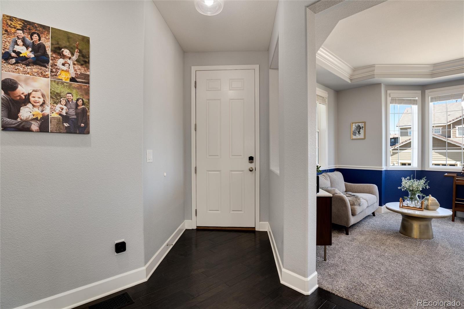 14390 Double Dutch Loop Parker, CO 80134 - Photo 6 of 50 a view of a livingroom with furniture and windows