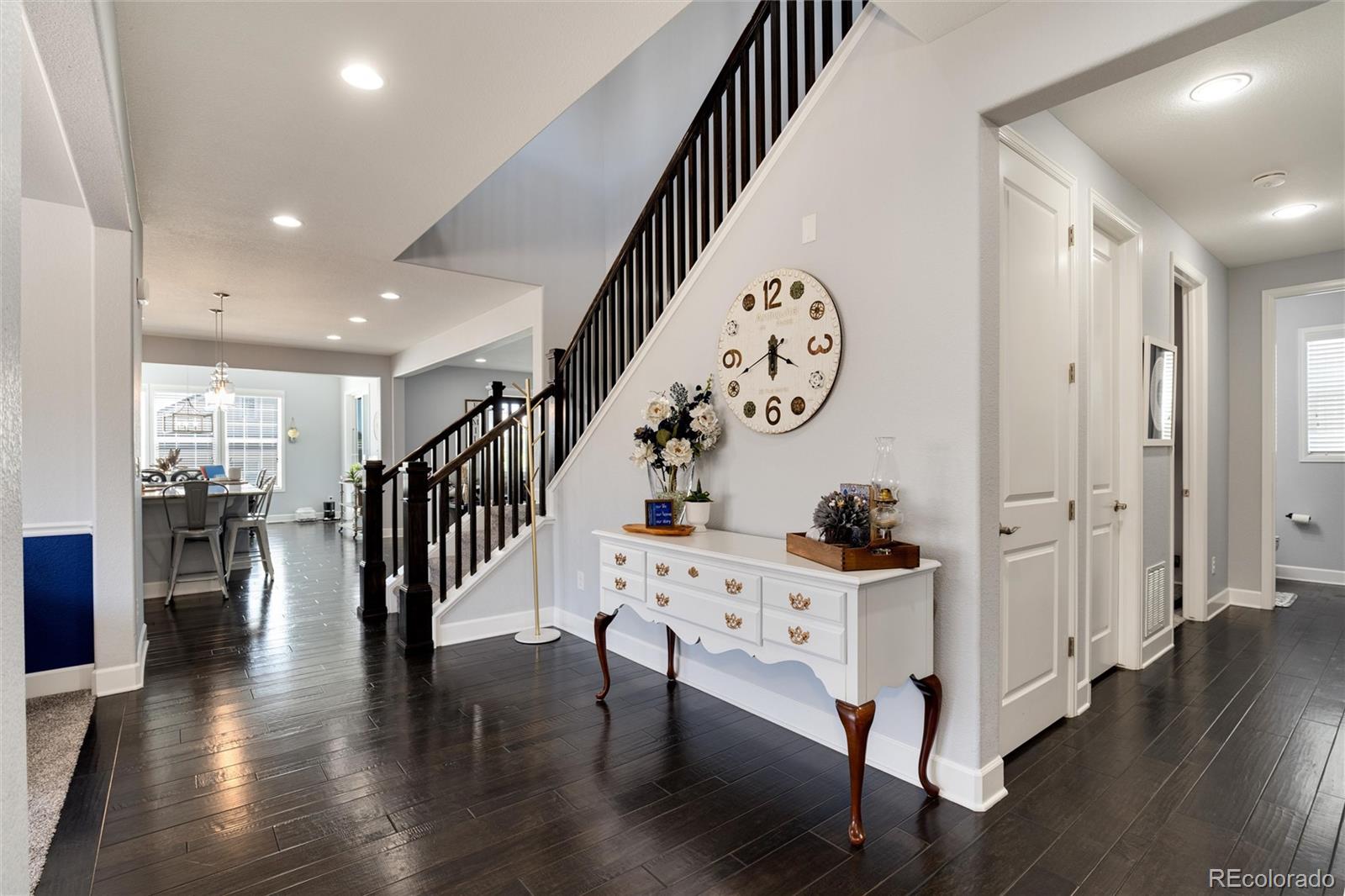 14390 Double Dutch Loop Parker, CO 80134 - Photo 7 of 50 a view of entryway with wooden floor