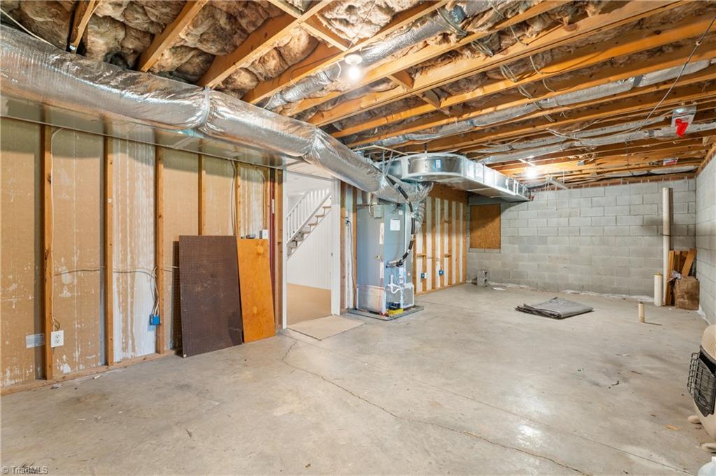 2531 Slate Road King, NC 27021 - Photo 30 of 40 Unfinished basement storage area